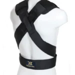 A mannequin showcases the Exxentric Squat Harness in black, with adjustable straps and a crossing pattern on the back, featuring a small Exxentric logo on the lower strap.