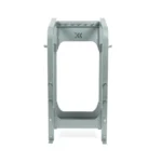 The Exxentric kBox Advanced Accessory Rack is a gray metal stand with a rectangular frame and logo near the top, featuring a sturdy, industrial design to support or hold objects.