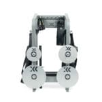 The Exxentric kBox Advanced Accessory Rack is a compact gym equipment piece featuring a silver frame, four large vertically arranged discs with stylized X logos, and fitness straps.