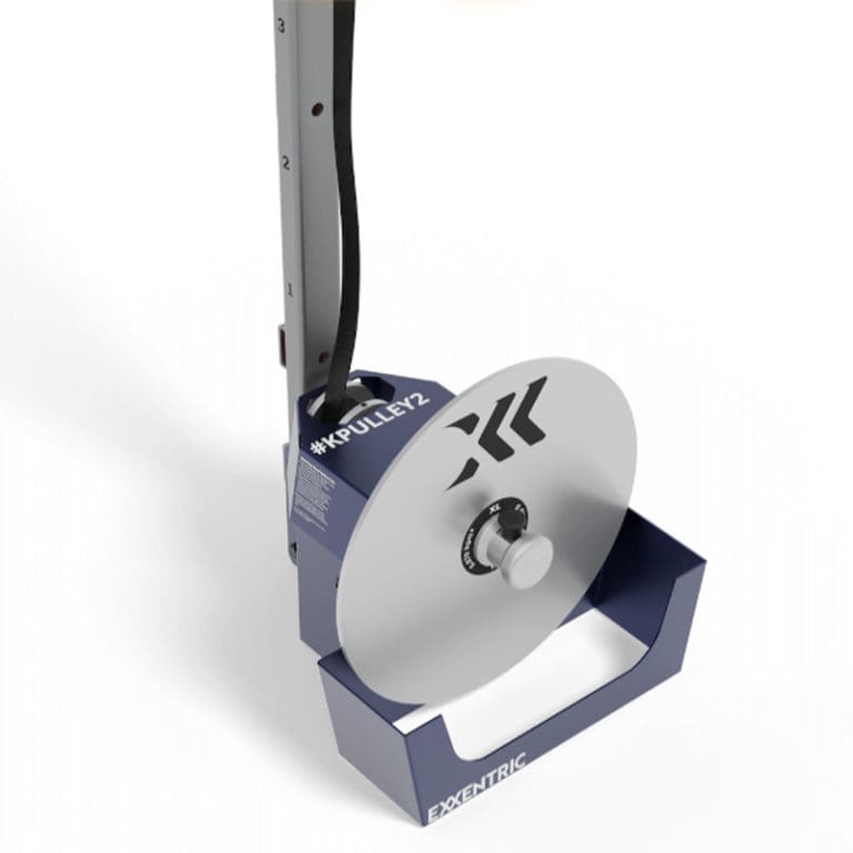 A close-up of the Exxentric kPulley2 Starter System shows a metallic disc with a black logo and Kpulletz label. The frame is dark blue with a sturdy vertical structure.