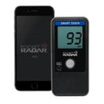 A Pocket Radar Smart Coach App System Bundle with a display showing 93 MPH is next to a smartphone running the Pocket Radar app.