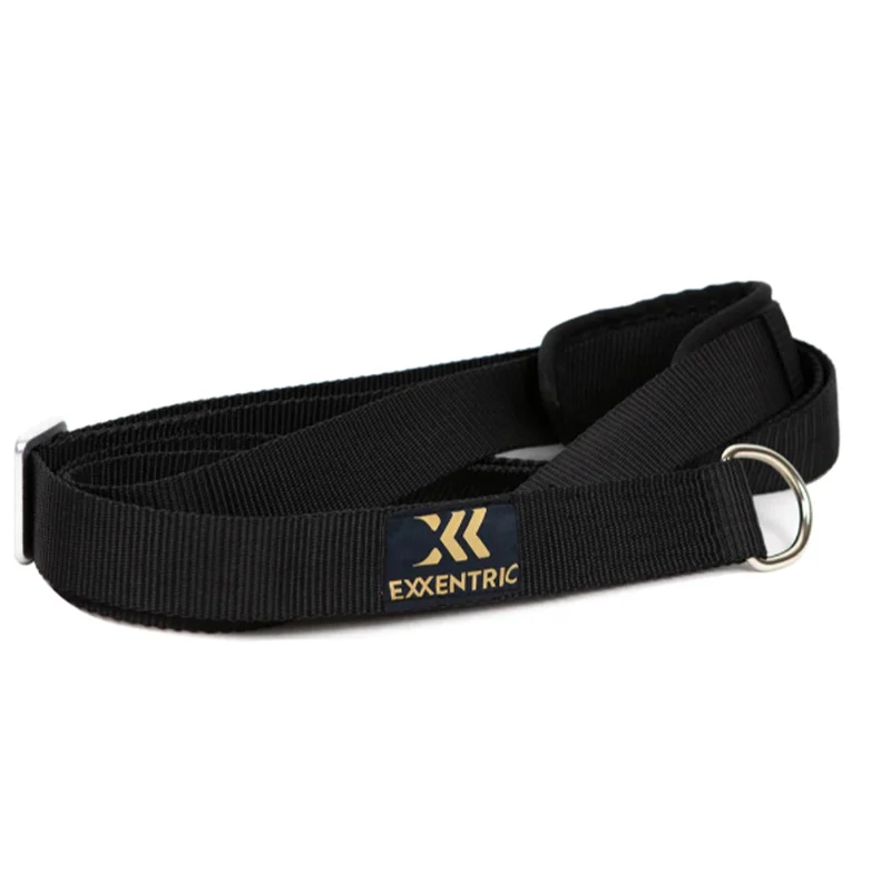 Black Exxentric Rotational Sling exercise belt with a metal ring and Exxentric in gold on the label.