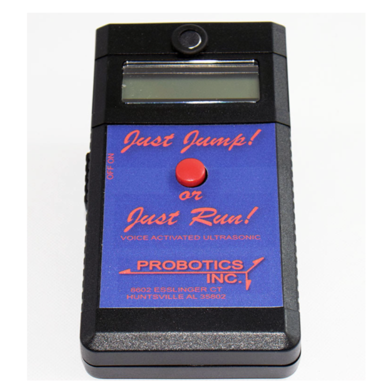 A handheld device called the Just Jump Plyometric Chip Upgrade features a screen, a red button, and the text "Just Jump!" or "Just Run!" along with "PROBOTICS INC." printed on its blue panel; it appears to be voice-activated and uses ultrasonic technology.