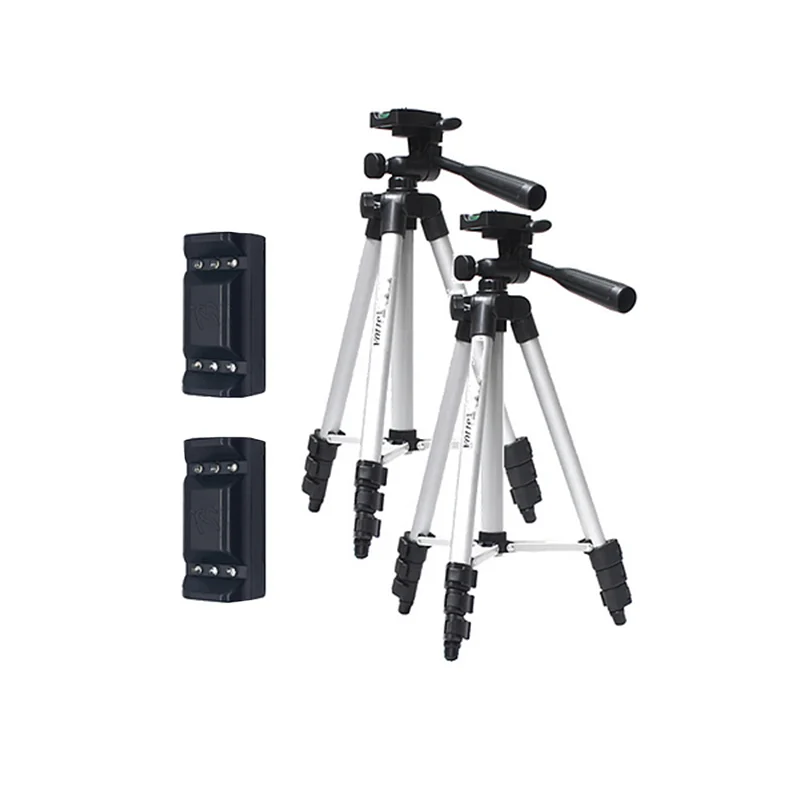 Two Dashr React Two Module Systems, featuring silver tripods with black adjustable legs and handles, are displayed side by side. Next to them, two black mount plates are arranged vertically.