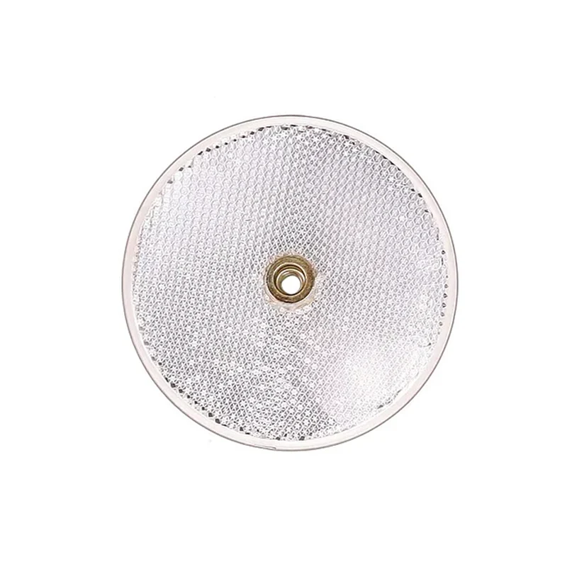 The Dashr Reactive Shuttle, a round textured silver reflector with a central hole and honeycomb-like pattern, is displayed against a plain white background.