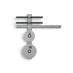 The Exxentric Wall Mounted Accessory Rack features two round weight plates, horizontal black padded bars, and additional storage slots on the right side.