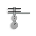 The Exxentric Wall Mounted Accessory Rack features two round weight plates, horizontal black padded bars, and additional storage slots on the right side.