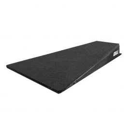 The Gill Athletics Launch Pad V2 is a sleek, black skateboard ramp with a wedge shape and flat, textured surface. Its designed for tricks and stunts with a smooth incline and is set against a white background to highlight its design.