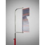 A PowerMax Vertical Jump Trainer with a red handle and multi-layered design featuring red, white, and blue elements for effective performance. A metallic frame enhances efficacy against bugs. Simple grey background.