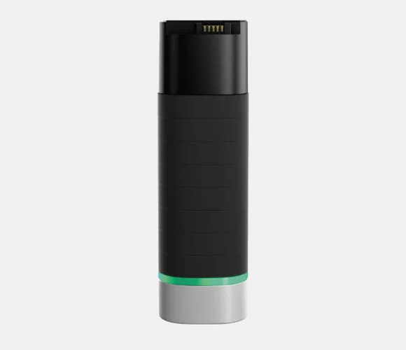 The Hypervolt 2 Pro Battery is a sleek, cylindrical black power bank with a silver base and green accent. It features a charging connector with four visible pins on top, set against a plain white background.