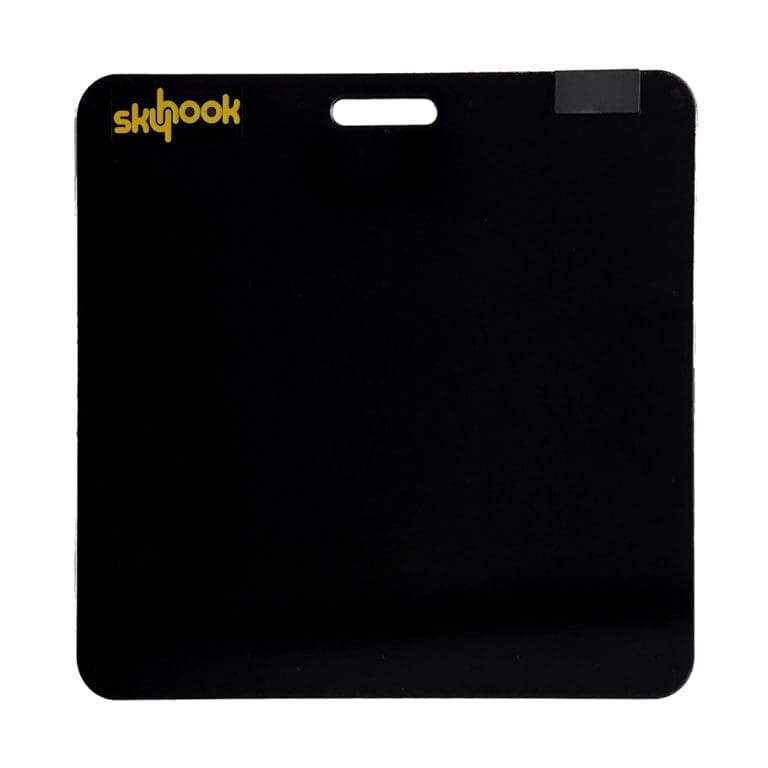 A black square-shaped mat with a small rectangular cutout at the top center. The word skyhook is printed in yellow in the top left corner.