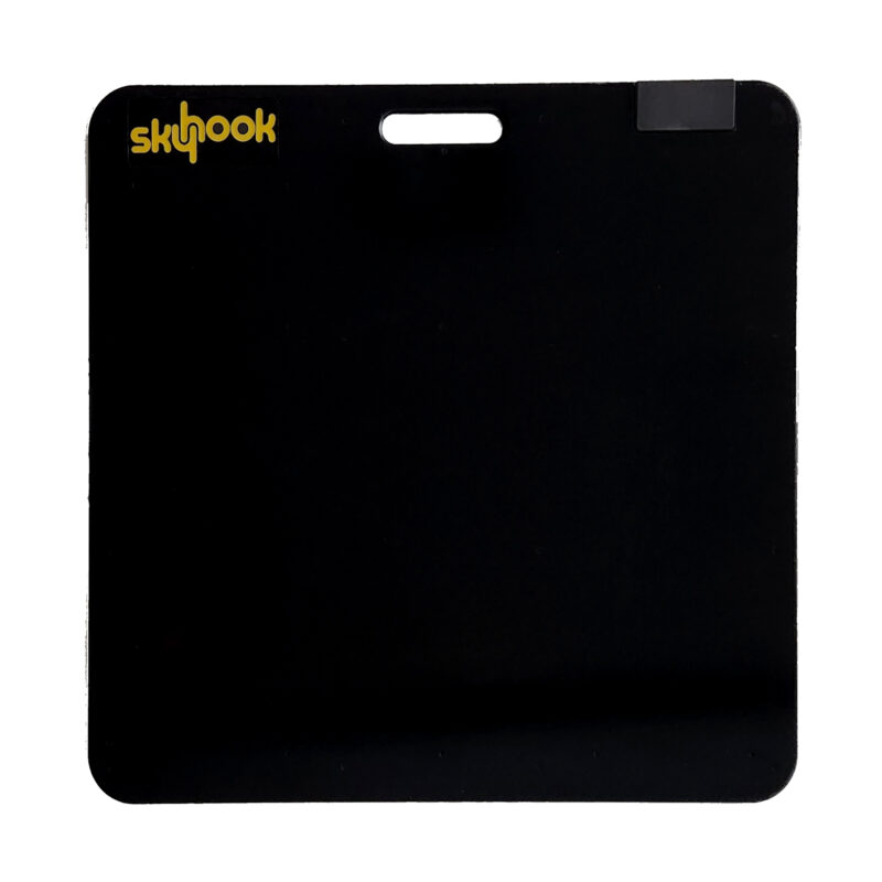 A black square-shaped mat with a small rectangular cutout at the top center. The word skyhook is printed in yellow in the top left corner.