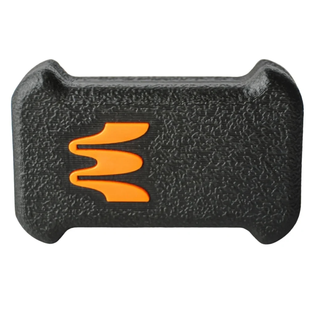 A black rectangular Enode Sensor with textured finish, curved edges, and an orange stylized M logo in the center, designed for Enode Velocity Based Training.