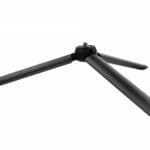 The Dashr Display is a black tripod stand with strong stability, featuring three extended legs that spread symmetrically from the center. Its base is equipped with a screw mount for device attachment.