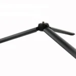 The Dashr Display is a black tripod stand with strong stability, featuring three extended legs that spread symmetrically from the center. Its base is equipped with a screw mount for device attachment.