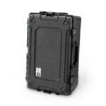 The Hawkin Dynamics Travel Case is a durable black hard case with a textured surface. It features secure latches, a side handle for easy carrying, and showcases its logo on the front. The case stands upright against a plain white background.