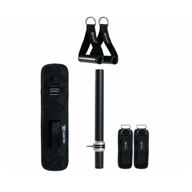 The Exxentric kBox Lite Starter System includes black fitness equipment: a padded carrying case, metal bar, two adjustable straps with rings, and two strap attachments with buckles, all displayed on a white background.