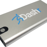 A silver rectangular Dashr Silver 2-Gate System power bank features Dashr and a blue running figure logo, with a round power button and multiple USB ports on the side.