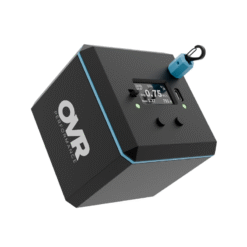 The OVR Performance VBT is a black, cube-shaped device featuring a digital display, two buttons, a blue top attachment, and the OVR Performance logo in white text on its side.