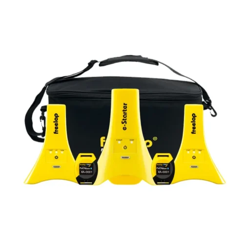 Set of four yellow electronic timing gates and two small display devices arranged in front of a black carrying bag with a shoulder strap. The items are labeled “freelap” and “e-Starter.”.