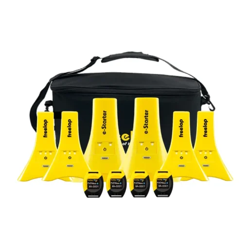 A black carrying bag is placed behind six yellow timing gates and four small black electronic devices, all labeled “freelap.” The equipment is arranged in two rows on a white background.