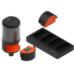 The VALD ForceFrame is a modular LED warning light system featuring a cylindrical light, two detachable battery packs, and a rectangular multi-slot charging dock, all in black and orange.
