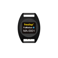 A black, oval-shaped electronic device labeled Freelap FxMotion Chip with a Bluetooth symbol, featuring two rectangular openings at the top and bottom.