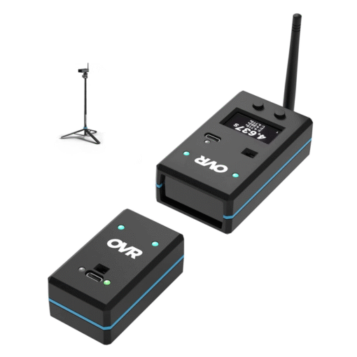 Two black OVR Performance Sprint Starter Kit wireless devices with blue accents (one featuring an antenna and display) sit on a white surface, with a tripod-mounted camera setup seen in the background.