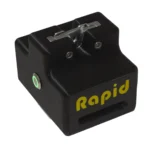 The Rapid Remote Release is a black pencil sharpener with “Rapid” in yellow on the side, a metal sharpening mechanism, and a round button.