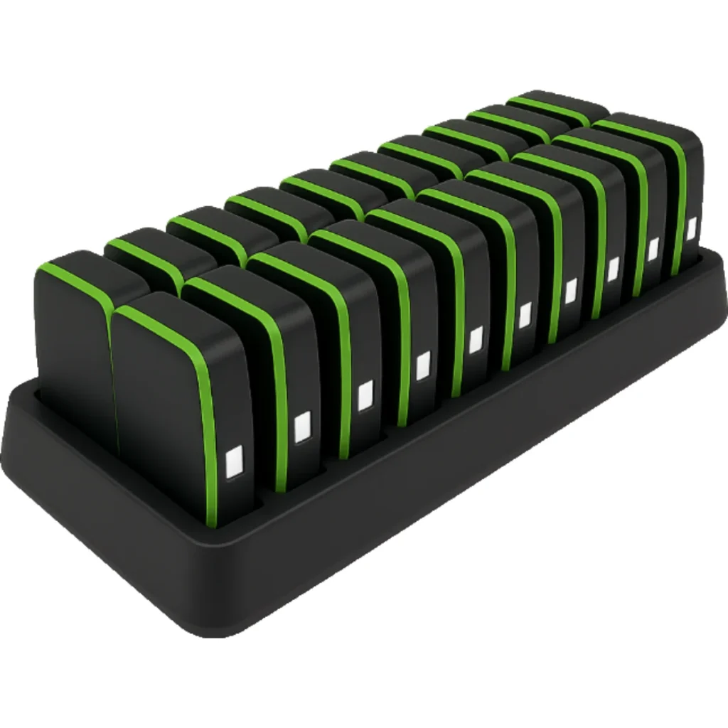 A black rectangular charging dock holds sixteen PlayerData GPS devices—black and green handheld units—arranged in two rows.