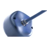 A close-up view of a blue cable plugged into the KINVENT K-Bubble, a rounded, smooth blue device featuring two visible screw holes.