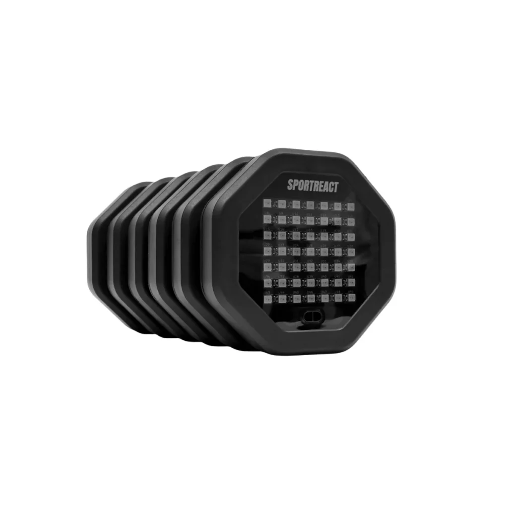 The Sportreact Lab Kit | X6 is a black, octagonal electronic device with a grid of small LED lights and "SPORTREACT" printed at the top, displayed at an angle on a white background.