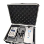 An open hard case with foam padding contains a Dashr Vert, a white handheld unit with a screen, charging cable, and separate accessory compartments.
