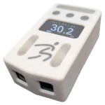 The Dashr Vert is a compact white electronic device featuring a screen showing 30.2 and other numbers, two ports, three round buttons, and a stylized figure logo on the front.