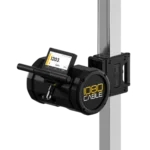 A black 1080 Cable is mounted on a vertical metal pole, featuring a digital display with workout data, a handle, and a cable attachment point.