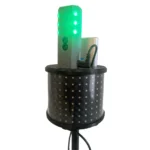 The Dashr 360 Display Pack is a cylindrical electronic device with a perforated surface, vertical green LED lights, buttons, and a cable, all mounted on a stand and shown against a white background.