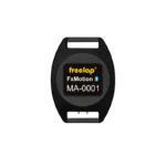 A black, oval-shaped electronic device labeled Freelap FxMotion Chip with a Bluetooth symbol, featuring two rectangular openings at the top and bottom.