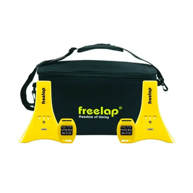 A black carrying bag with freelap branding is placed behind two yellow timing gates and two small yellow electronic devices, all used for athletic timing and training.