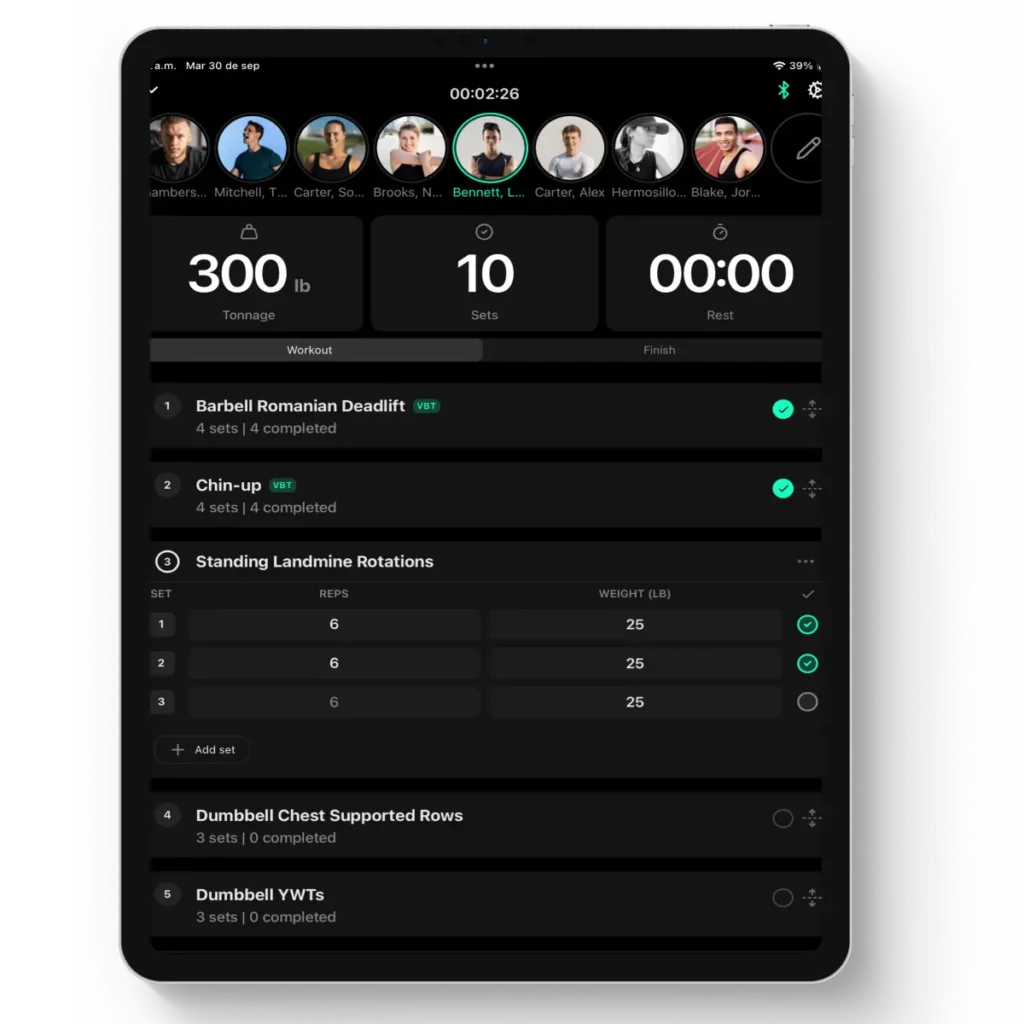 A tablet screen showcases the Vitruve Encoder + App Software, displaying completed sets and weights for exercises such as Barbell Romanian Deadlift, Chin-up, and Standing Landmine Rotations, with a timer and team member icons at the top.